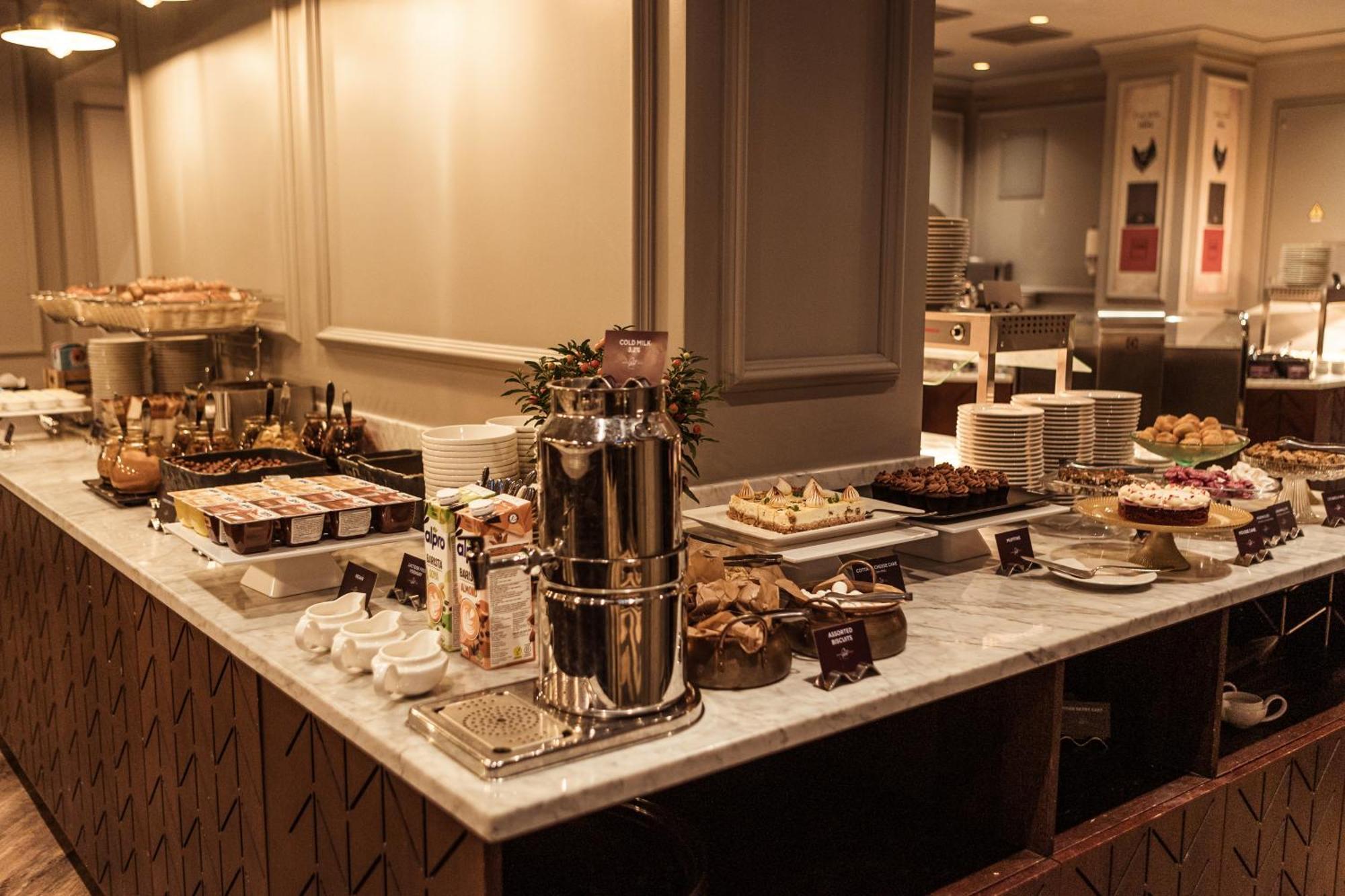 Grand Poet Hotel And Spa By Semarah Riga Exterior photo A dessert buffet